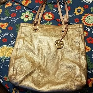 Michael Kors gold satchel purse
